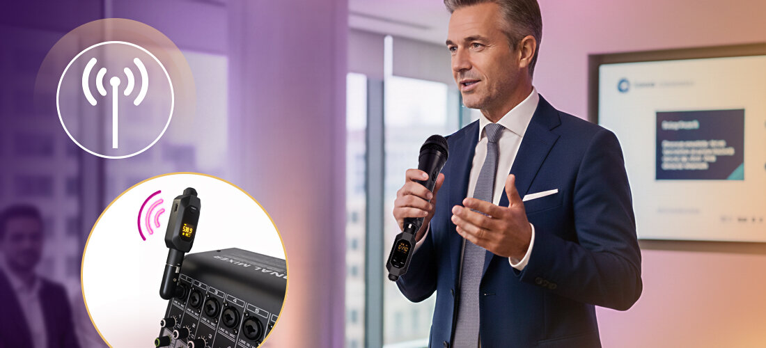 Transmiter bezprzewodowy MUSICMATE MM-A400 AirXLR mobilność zasięg 50 m mikrofon XLR bez kabli, osoba trzymająca mikrofon z podpietym transmiterem w ręku