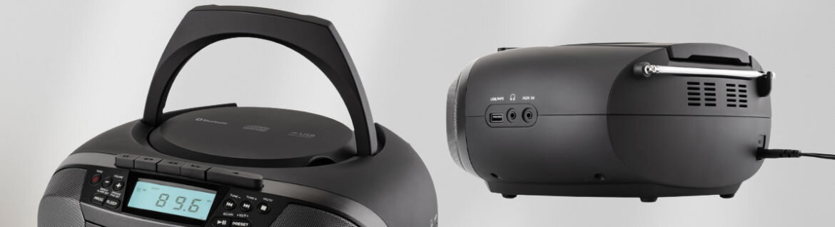 Radioodtwarzacz JVC zasilanie 6xC moc stereo 2 x 2 W alarm zegar, Radioodtwarzacz po skosie na szarym tle