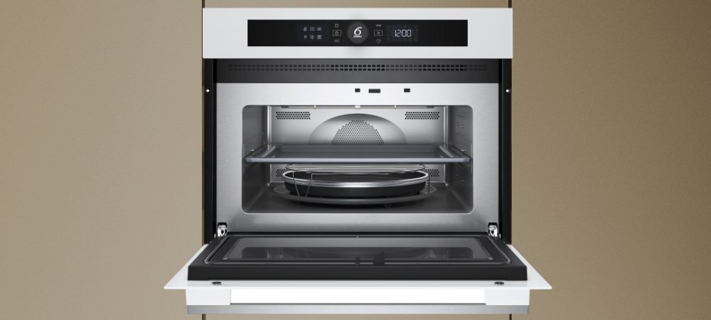 KUCHNIA MIKROFALOWA WHIRLPOOL WMW57DHMW wizualizacja Najważniejsze cechy funkcje 7 stopni mocy kolor biały pojemna komora 40 litrów drzwi otwierane w doł komora ze stali nierdzewnej