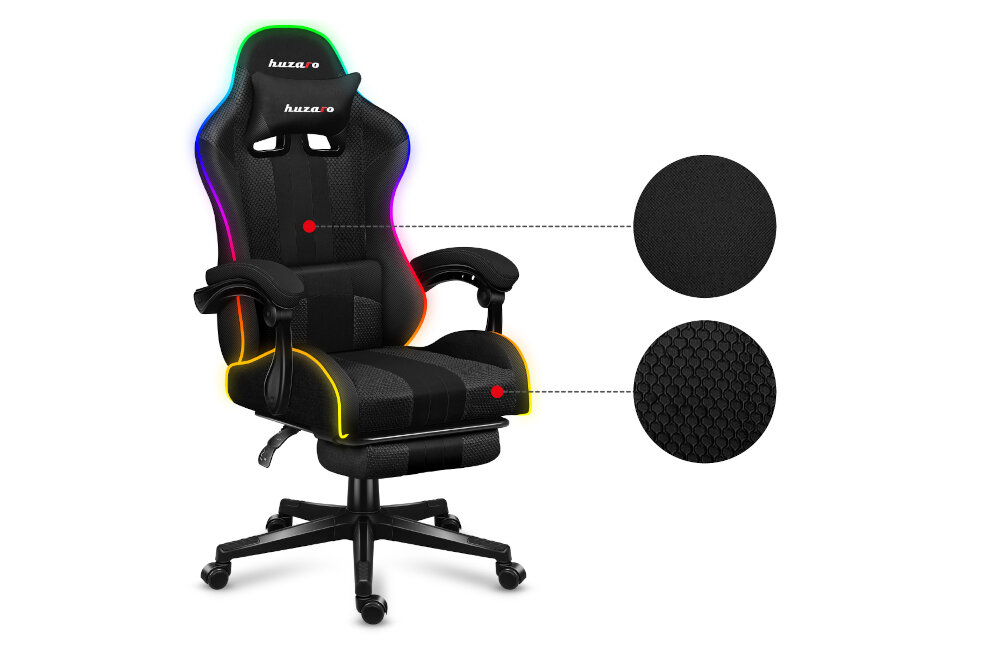 Czarny fotel gamingowy z podświetleniem RGB na krawędziach, z widocznymi dwoma rodzajami materiału obicia. Na zagłówku znajduje się logo \'huzaro\'.
