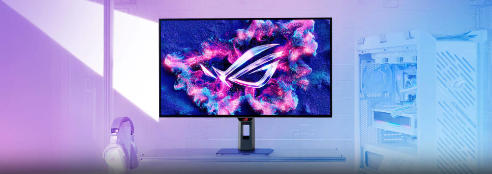 Monitor ASUS ROG Strix XG32UCDS 31.5 cala 3840x2160px 165Hz 0.03 ms [GTG] prezentacja monitora na biurku pastelowe kolory w tle niebiesko-różowe, odświeżanie, płynność, czas reakcji płynne ruchy