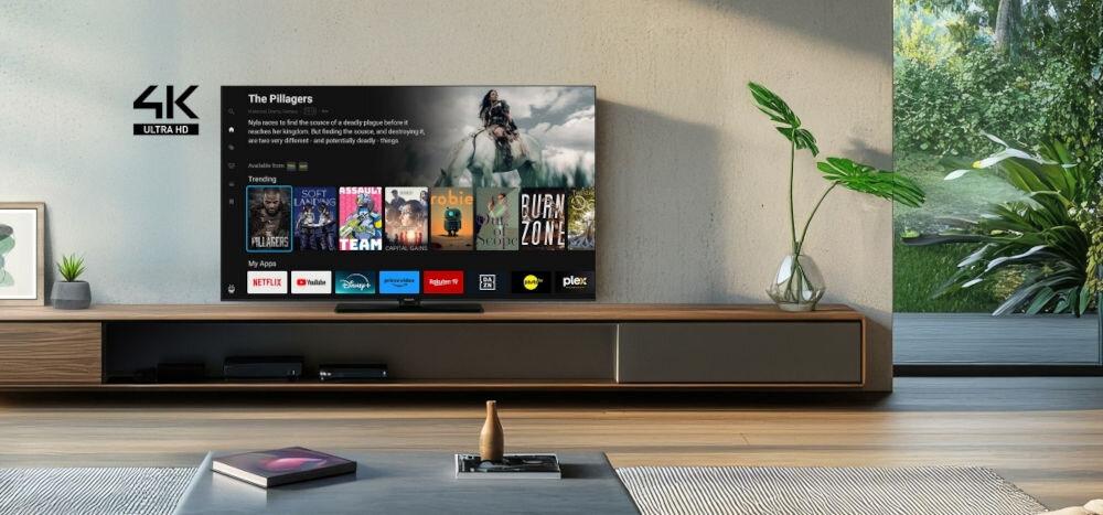 Telewizor PANASONIC TB-43W61AEZ 4K LED TiVo jakość obrazu smart funkcje, telewizor stojący na komodzie w pomieszczeniu