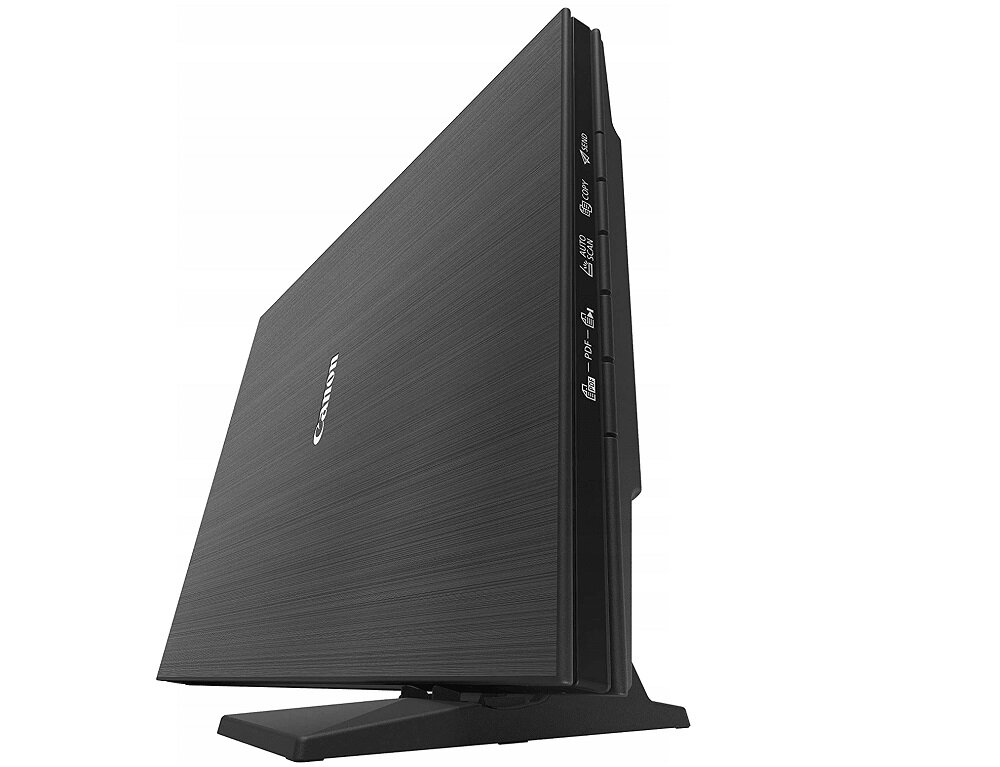 Skaner w kolorze czarnym ustawiony pionowo na podstawce. Na bocznej krawędzi widoczne są przyciski z ikonami i tekstem: \'PDF\', \'Auto Scan\', \'Copy\', \'Send\'.