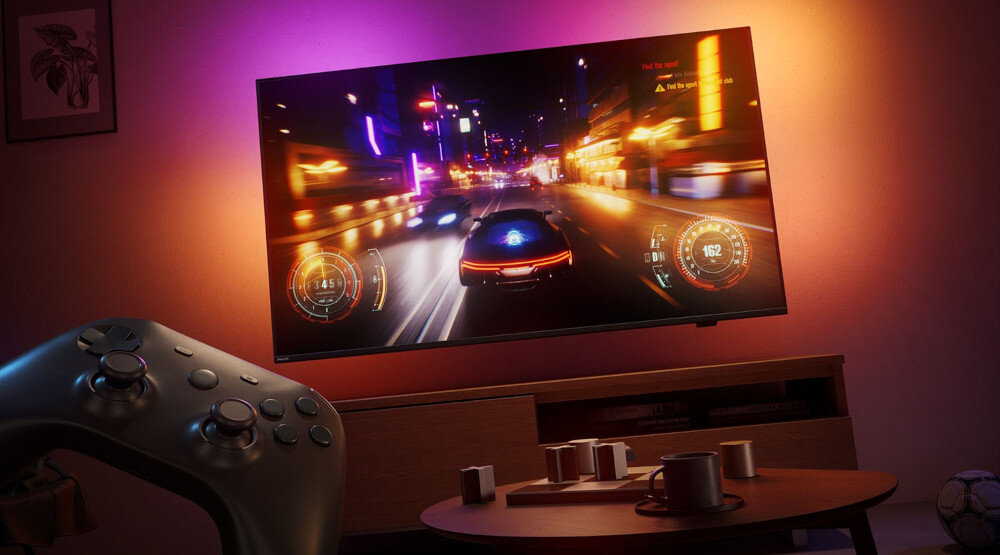 Telewizor PHILIPS 48OLED820 HDMI 2.1 120Hz VRR gry, telewizor zawieszony na ścianie z włączoną grą wideo, kontroler w tle