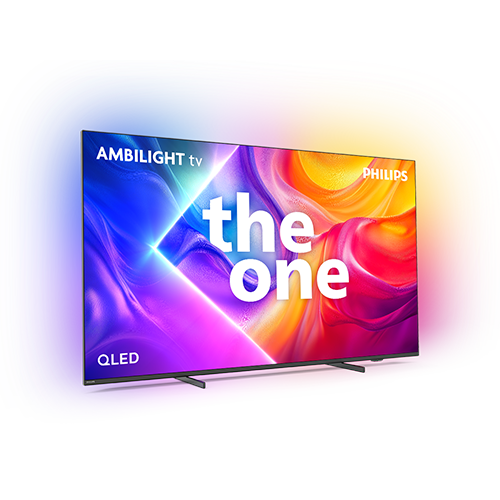 Telewizor z dużym ekranem wyświetla kolorowe, abstrakcyjne wzory z napisem \'the one\'. Widoczne są napisy \'AMBILIGHT tv\', \'PHILIPS\' oraz \'QLED\'.