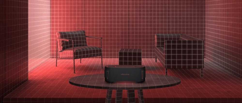 Głośnik mobilny LG Bounce AI Calibration dopasowanie pomieszczenie, głośnik mobilny stojący na stoliku w pomieszczeniu