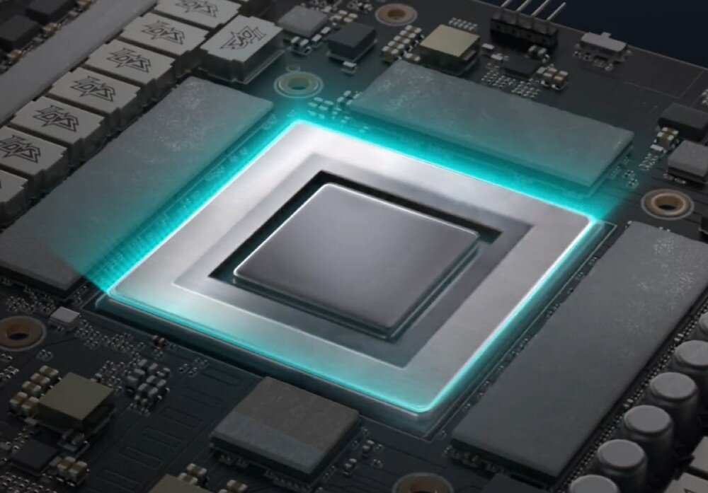 Karta graficzna ASUS GeForce RTX 5070 PRIME White OC Edition 12GB Zbliżenie na płytkę drukowaną karty graficznej z widocznym procesorem graficznym otoczonym podkładką termiczną w kolorze turkusowym oraz układami pamięci GDDR7