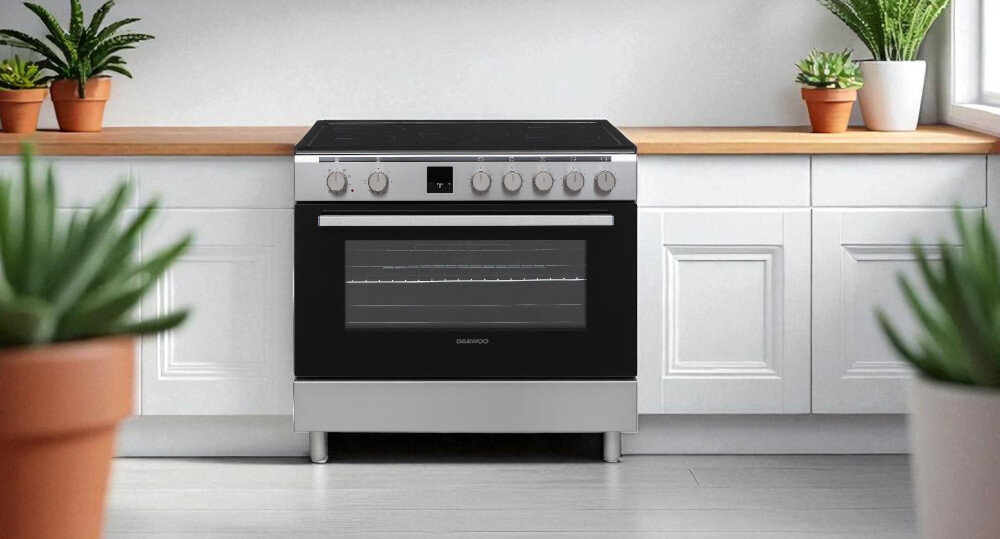 KUCHNIA DAEWOO F96EIDTE19INM-PL wizualizacja lifestyle kuchnia front pokrętła programator piekarnik pojemność 105 litrów 5 stref gotowania wok 9 programów pieczenia Elegancki wygląd konstrukcja
