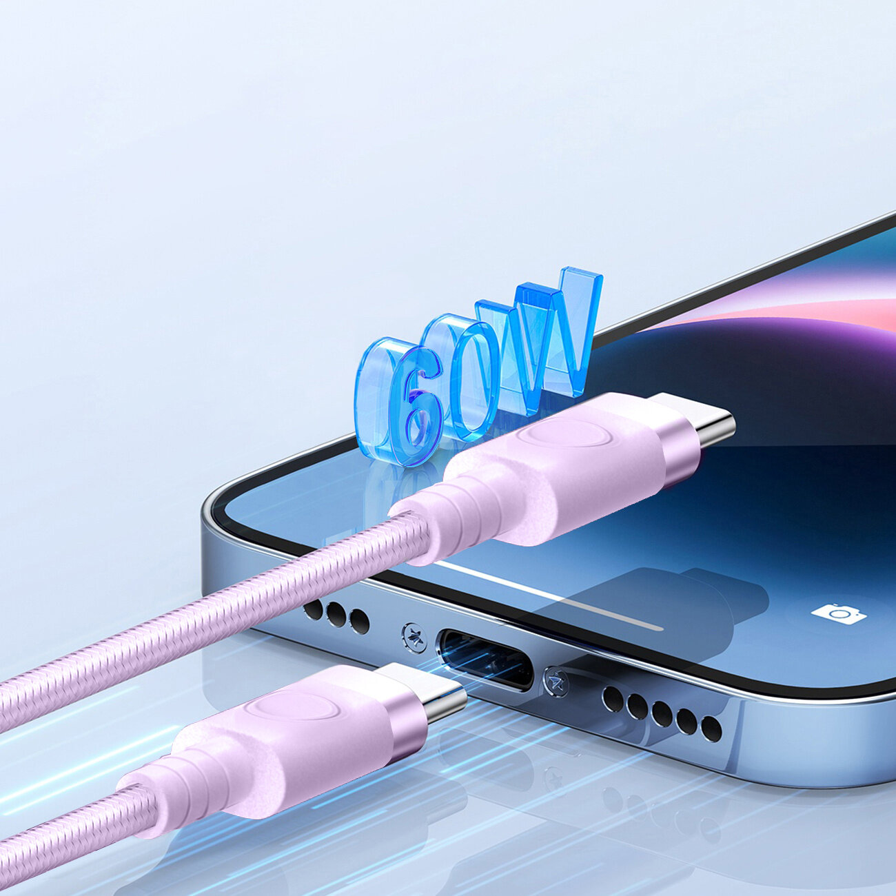 Na obrazie widać fioletowy kabel USB-C podłączony do smartfona. Nad kablem unosi się napis \'60W\'.