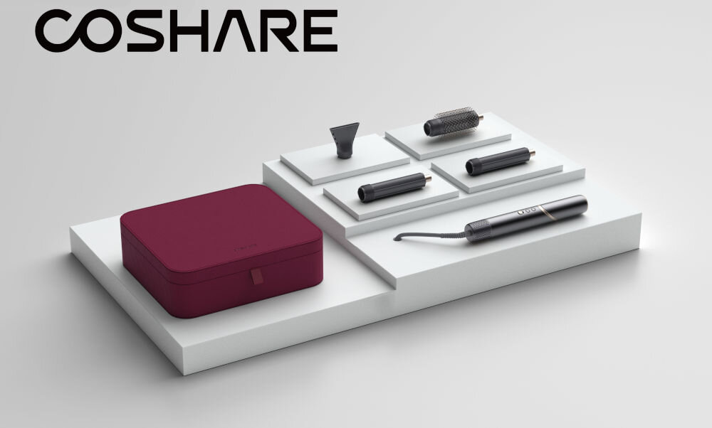 Suszarko-lokówka COSHARE SuperFlow InStyle HS30E 1000 W Szary jasne tło suszarko lokówka leży na podeście z końcówkami i bordowym etui optymalna stylizacja