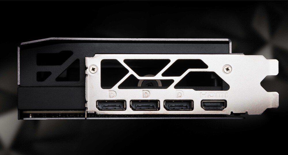 Karta graficzna MSI GeForce RTX 5090 Suprim Liquid SOC 32GB Panel wyjść karty graficznej z trzema portami DisplayPort i jednym portem HDMI, widoczne także elementy mocujące, porty, złącza
