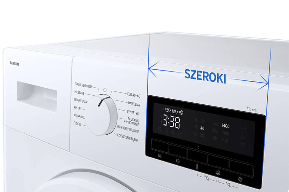 Pralka z panelem sterowania, na którym widoczny jest wyświetlacz cyfrowy oraz pokrętło z różnymi programami prania. Na górze znajduje się napis \'SZEROKI\'.