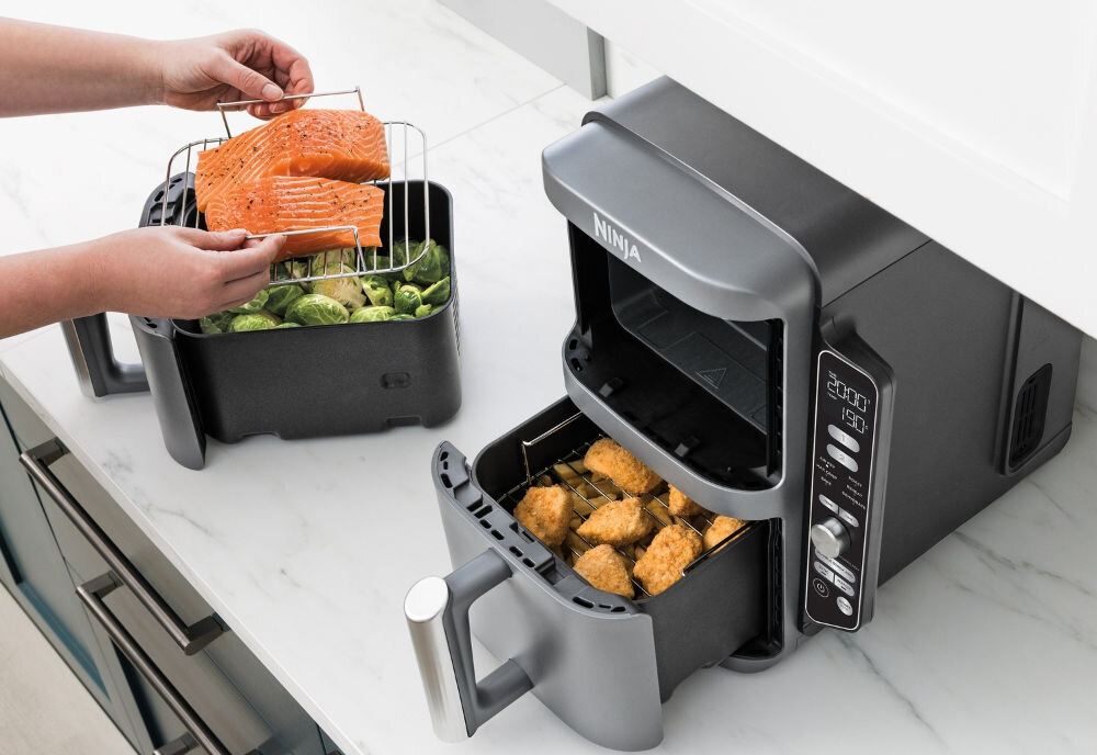 Frytkownica beztłuszczowa NINJA SL400EU Air Fryer z podwójnym koszem funkcja gotowania czasu temperatury funkcja SYNC koniec gotowania równocześnie świeże dania dla róznych gustów i wymagań dietetycznych jedna szuflada na mniejsze porcje talerz w każdej szufladzie gorące powietrze 