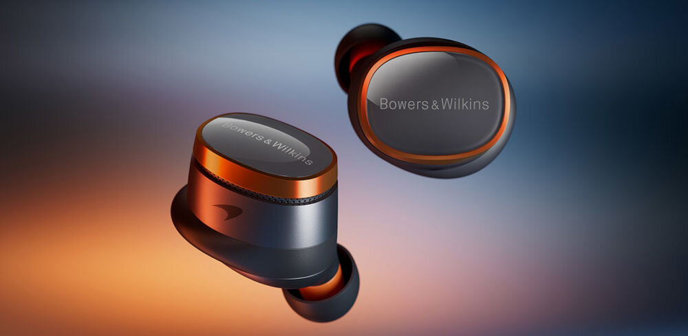 Słuchawki dokanałowe BOWERS & WILKINS PI8 McLaren ANC długi czas odtwarzania bateria 20 godzin, słuchawki dokanałowe na pomarańczowo niebieskim tle
