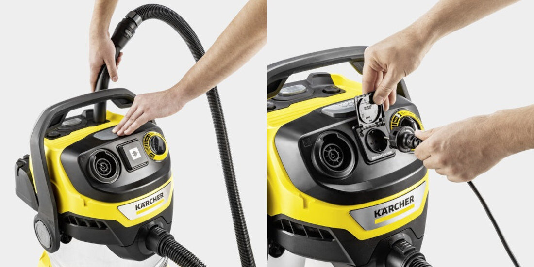 Na obrazie widoczny jest odkurzacz warsztatowy z logo KARCHER, z żółto-czarną obudową i panelem sterowania z pokrętłami. Ręce osoby obsługującej odkurzacz trzymają wąż i podłączają wtyczkę do gniazda na urządzeniu.