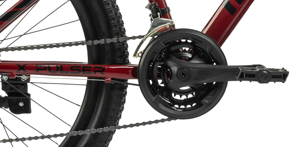 Rower młodzieżowy INDIANA X-Pulser 2.6 26 cale Czerwony zbliżenie na korbę i wolnobieg stalowa wydajna konstrukcja korby marki INDIANA wolnobieg BEST typu 14-28z solidny i wytrzyma obciążenie nawet w trudnych warunkach