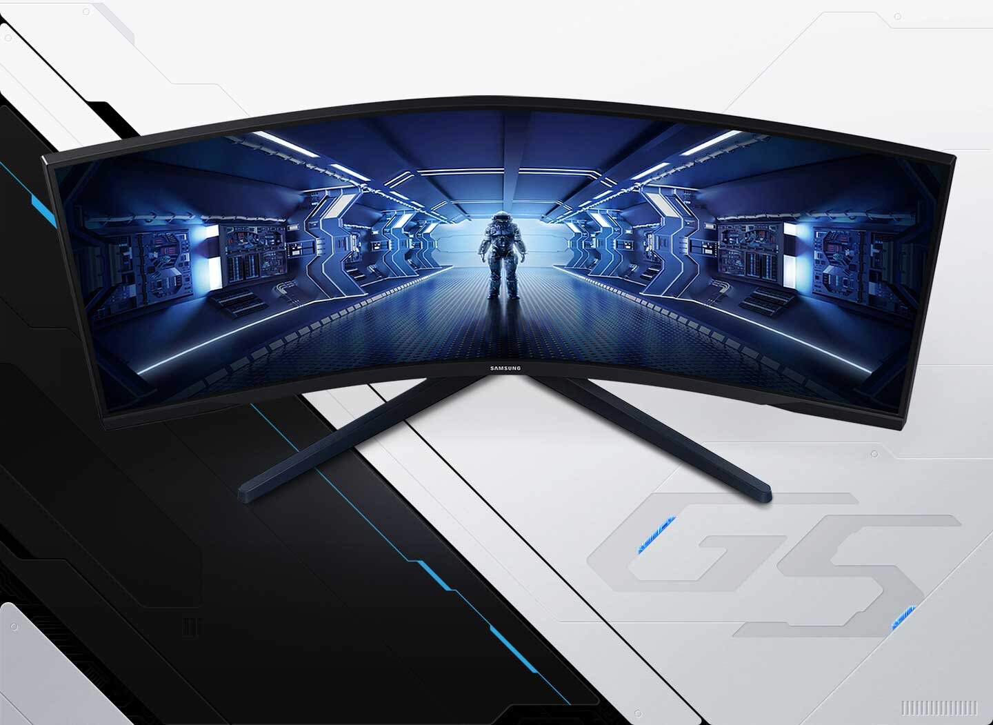 Monitor z zakrzywionym ekranem wyświetla futurystyczny obraz wnętrza statku kosmicznego z postacią w skafandrze. Na obudowie widoczne jest logo \'Samsung\'.