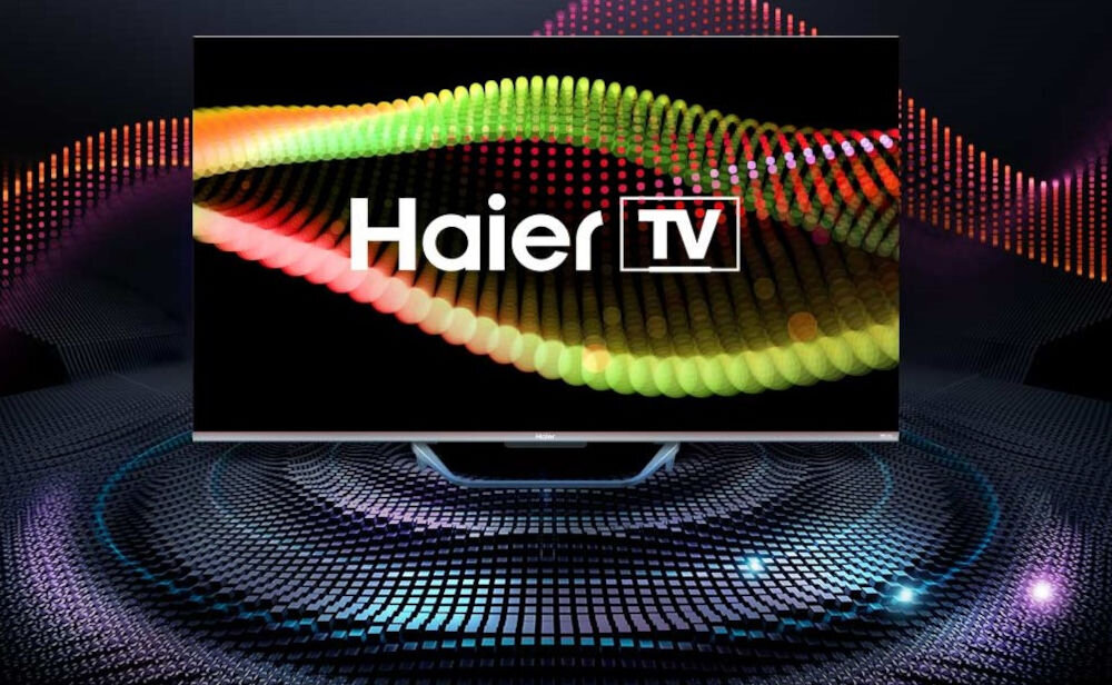 Telewizor HAIER H65Q80FUX dbx-TV, mocny dźwięk, przestrzenne brzmienie, wyraźne dialogi, telewizor od frontu na ciemny tle