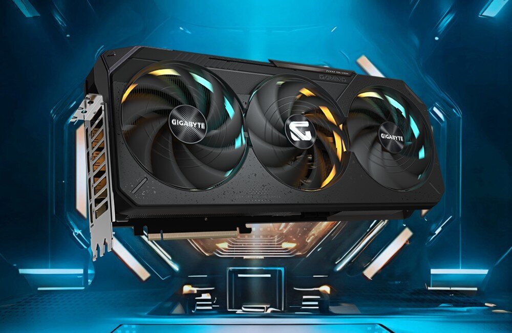 Komputer MAD DOG GeForce RTX5090 DLSS 4 Reflex Edition 2 Powered by Gigabyte C500-A05WR32WP Karta graficzna z podświetlanymi wentylatorami RGB na tle geometrycznych świateł