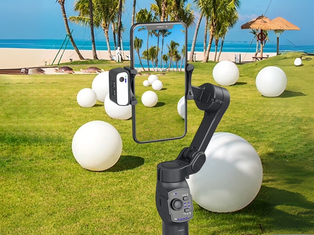 Gimbal MAJESTICLINE AJ Axis AI
stabilizator w dłoni z przymocowanym telefonem nagrywający narciarza joystick panel sterowania dostosowanie kąta 360 stopni vlog ujęcia sportowe
