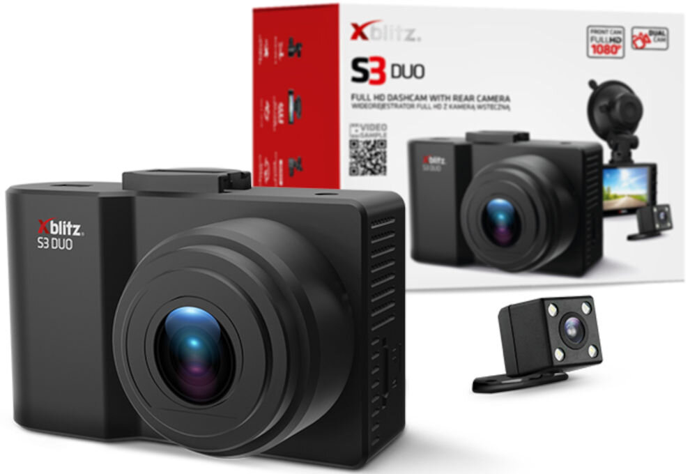 Na obrazie widoczny jest wideorejestrator XBLITZ S3 Duo z dużym obiektywem, a w tle znajduje się jego opakowanie z napisem \'S3 DUO FULL HD DASHCAM WITH REAR CAMERA\'. Obok urządzenia leży mniejsza kamera, prawdopodobnie tylna.
