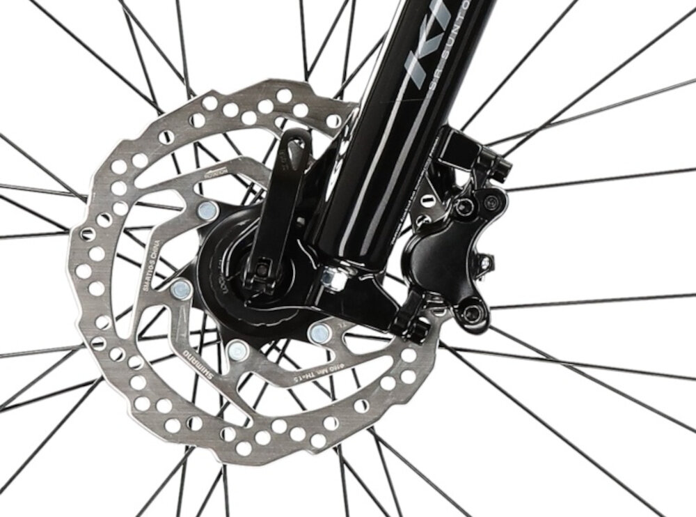 Rower górski MTB KROSS Level 1.0 M17 29 cali męski Czarno-czerwony zbliżenie na przedni hamulec podstawa bezpieczeństwa hamulce tarczowe hydrauliczne duża siła hamowania płyn hamulcowy hamulce z przodu i z tyłu podwójny pakiet bezpieczeństwa
