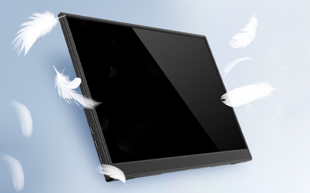 Monitor EXTRALINK Smart Life S15 Czarne urządzenie o smukłej obudowie przedstawione na tle z unoszącymi się białymi piórami, przeznaczenie, konstrukcja, waga, uchwyt
