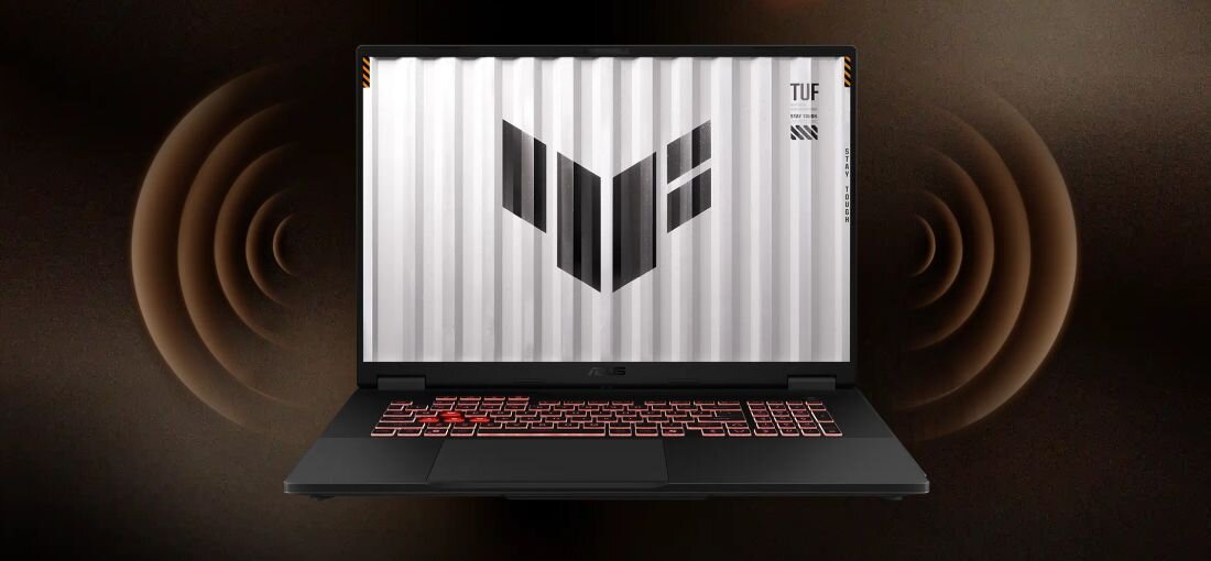 Laptop ASUS TUF Gaming prezentuje głośniki z szeroką sceną dźwiękową na grafice z falami akustycznymi w tle – Dwa głośniki z Dolby Atmos