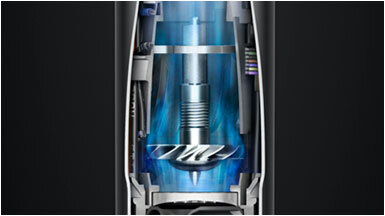 Obraz przedstawia wnętrze urządzenia z widocznym mechanizmem i niebieskim światłem wokół centralnego elementu.