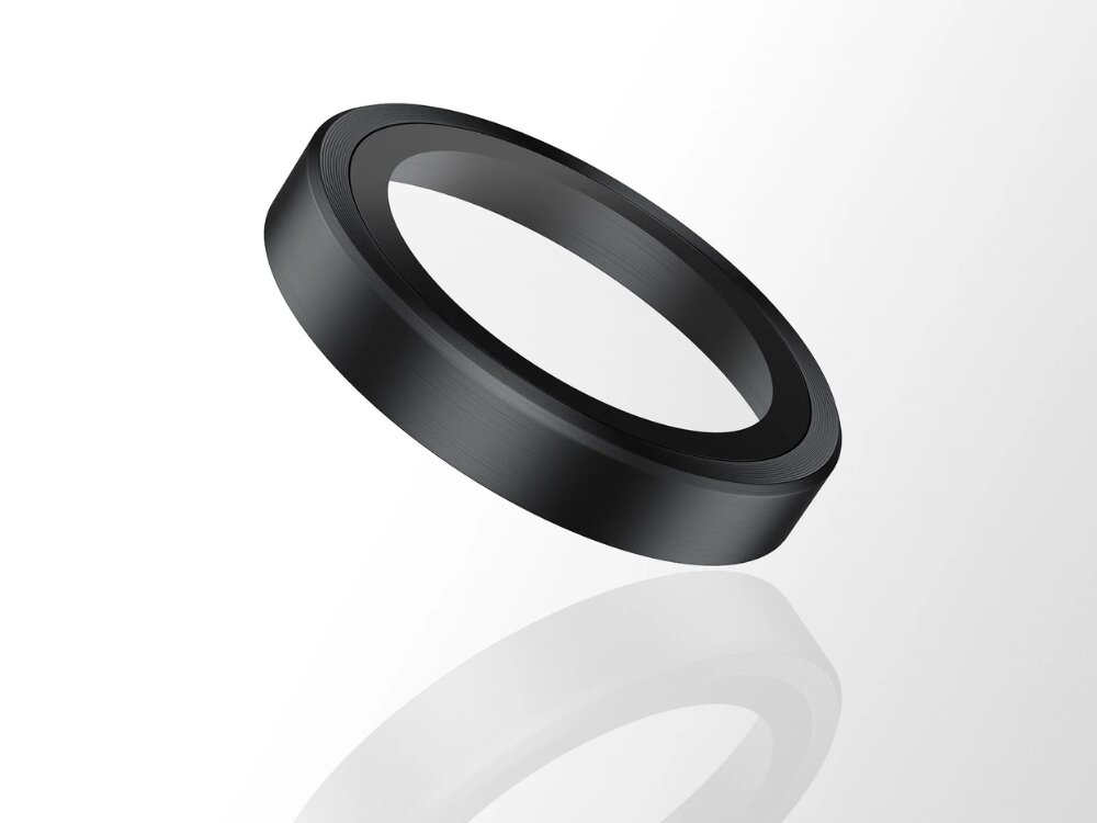 Szkło hartowane na obiektyw PANZERGLASS Hoops Lens Protector pierścień na białym tle silikonowa warstwa klejąca dołączony aplikator aparat w dobrym stanie