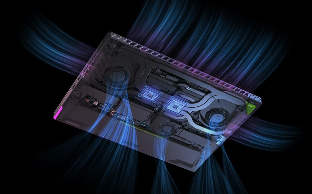 Wnętrze laptopa ASUS ROG z systemem chłodzenia dwoma wentylatorami rurkami cieplnymi i niebieskimi efektami świetlnymi na czarnym tle - System chłodzenia 