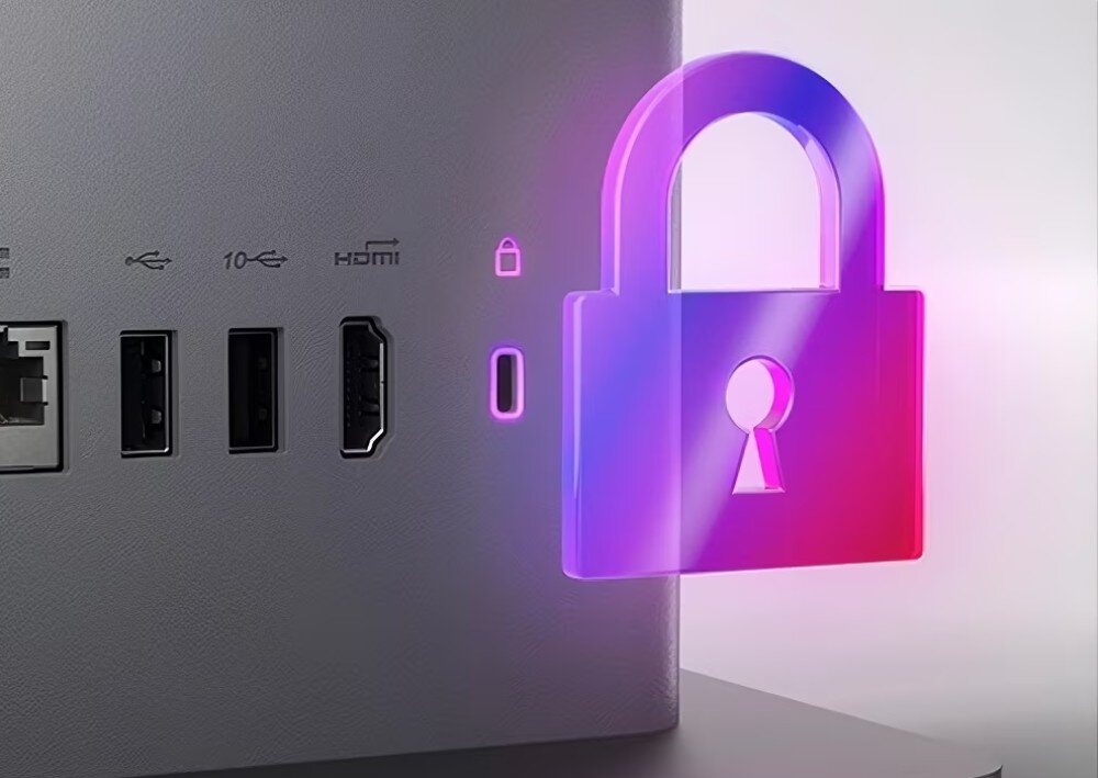 Komputer All in One LENOVO ThinkCentre neo 50a 27 Gen 5 Zbliżenie na tylny panel obudowy urządzenia z portami komputerowymi oraz ikonami graficznymi, obok których umieszczono półprzezroczystą, świecącą na fioletowo i różowo grafikę kłódki symbolizującą bezpieczeństwo, zabezpieczenia, gniazdo Kensington