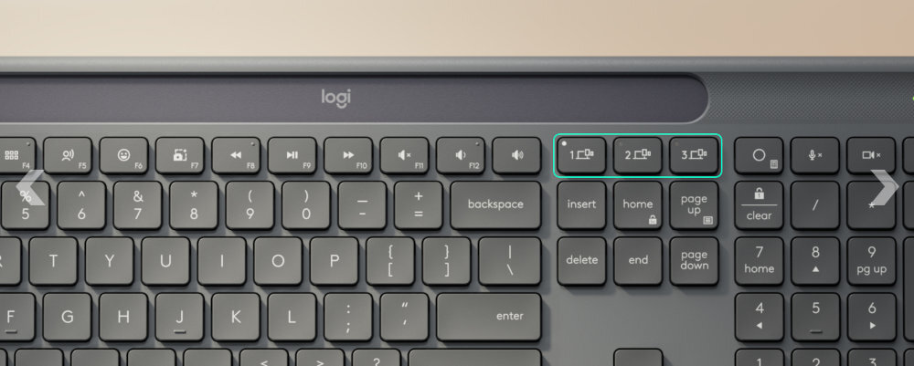 LOGITECH Slim Solar+ jednego przycisku komputerem, smartfonem i tabletem myszą Logitech bez konieczności ponownego parowania - zbliżenie na klawisze od przełączania urządzeń