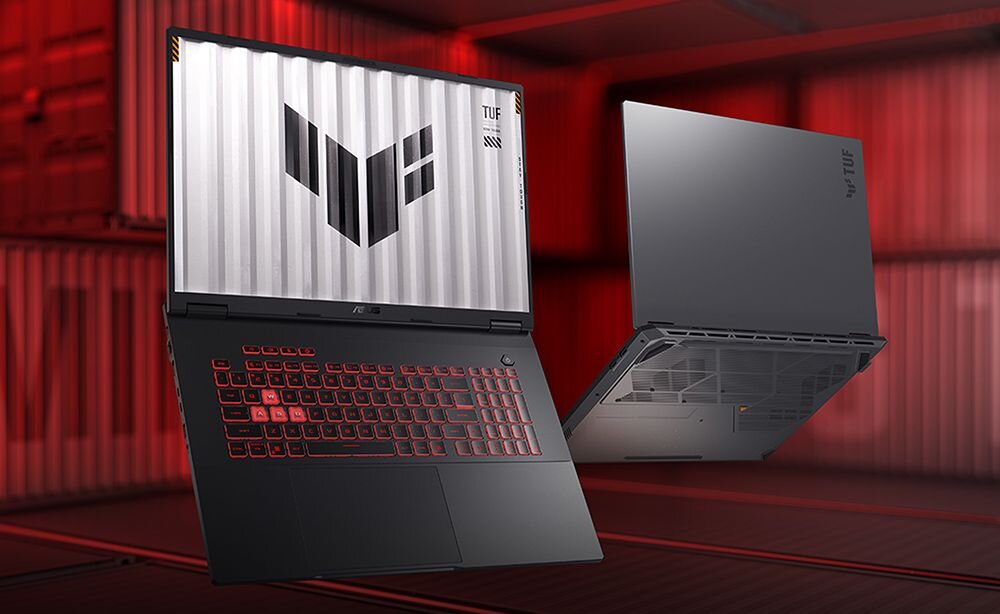 Laptop ASUS TUF Gaming z czerwonym podświetleniem klawiatury pokazany obok zamkniętej obudowy na czerwonym tle kontenerowym