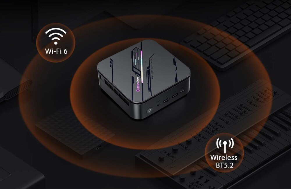 Komputer BLACKVIEW MP100 Pro Kompaktowe urządzenie na biurku otoczone pomarańczową poświatą z symbolami 'Wi-Fi 6' i 'Wireless BT5.2', łączność, Wi-Fi, Bluetooth