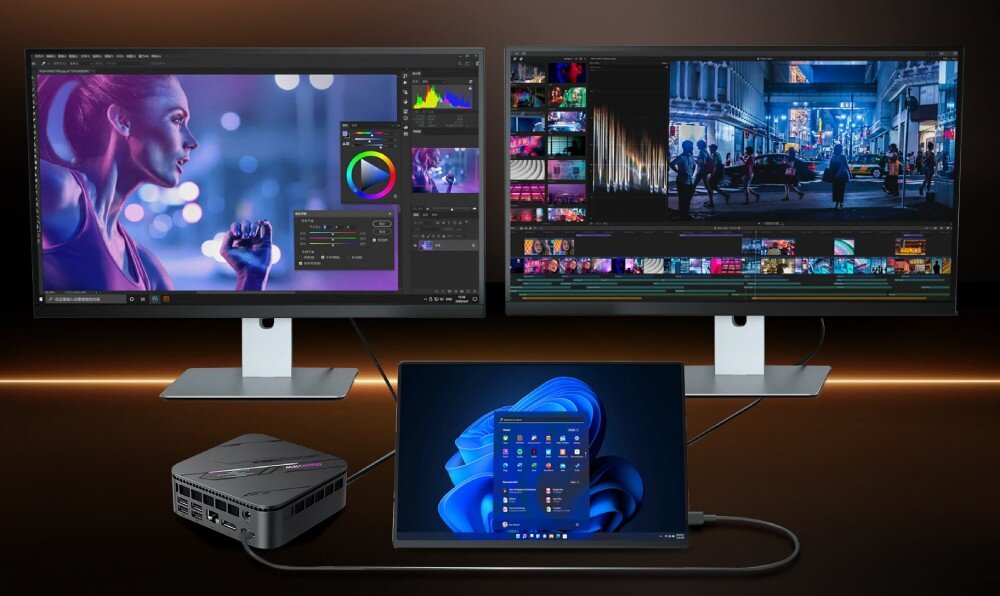 Komputer BLACKVIEW MP100 Pro Mały komputer połączony kablami z dwoma monitorami i laptopem, na których widać otwarte programy graficzne i wideo, porty, złącza