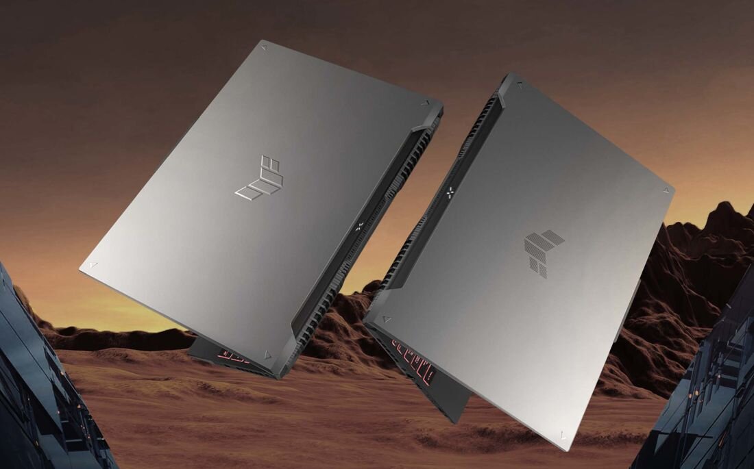 Dwa laptopy ASUS TUF Gaming pokazane od góry, eksponując metalową obudowę przeznaczoną do mobilnego grania – warianty kolorystyczne Mecha Grey i Jaeger Grey z logo TUF i stonowaną ciemnoszarą kolorystyką