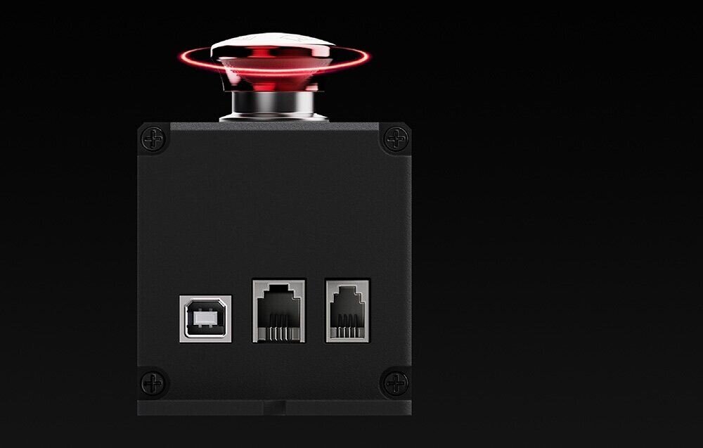 Awaryjny wyłącznik zasilania Moza Racing E-Stop RS063 wyłącznik pokazany od strony portów na ciemnym tle konfiguracja działania przycisku tryby porty skuteczne zarządzanie pracą zestawu