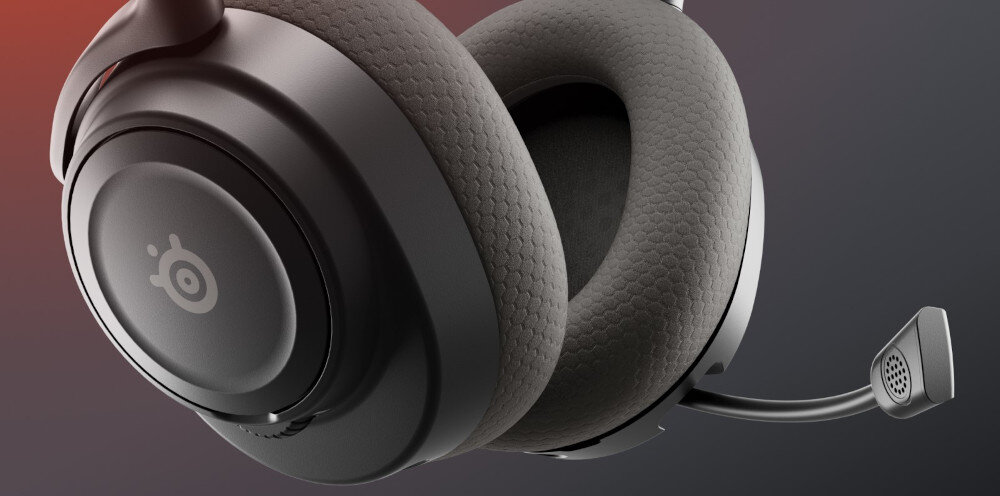 Słuchawki STEELSERIES Arctis Nova 7X Gen 2 impedancja 36 Ω pasmo 20-22000 Hz membrana 40 mm, kadr słuchawek skierowany na nauszniki i mikrofon