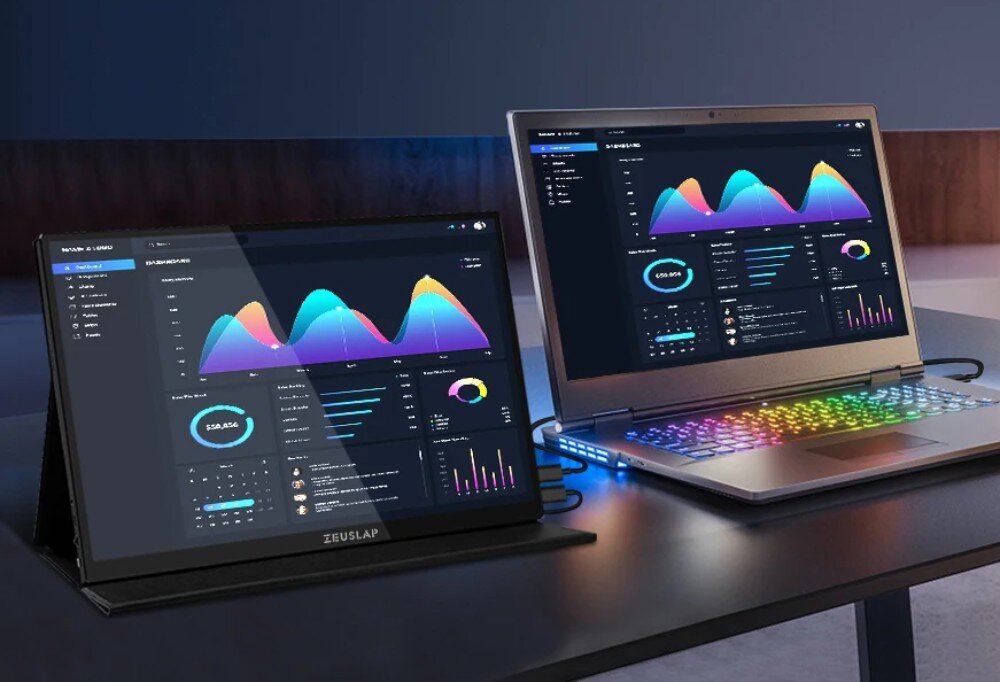 Monitor ZEUSLAP P16KT Monitor przenośny obok laptopa z podświetlaną klawiaturą, oba urządzenia pokazują wykresy i panele z danymi, konstrukcja, waga, wymiary, obudowa