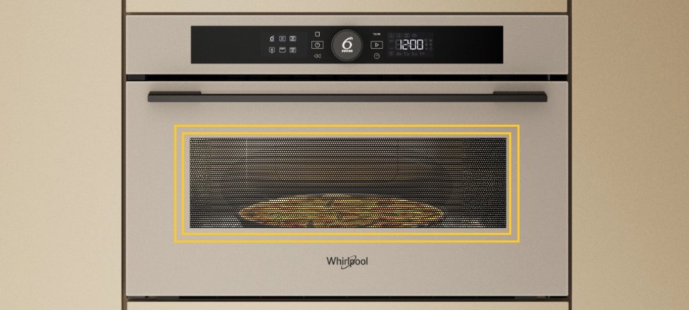 KUCHNIA MIKROFALOWA WHIRLPOOL WMD54MBG lifestyle front zamknięta panel funkcje oświetlone wnętrze potrawa w środku logo Funkcje JetStart i Jet Menu błyskawiczne nagrzewanie pełna moc automatyczne dobieranie ustawień
