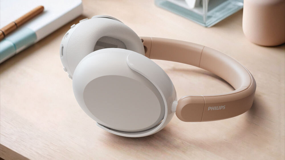 Słuchawki nauszne PHILIPS TAK5500RT mikrofon redukcja szumów rozmowy online, słuchawki leżące na biurku