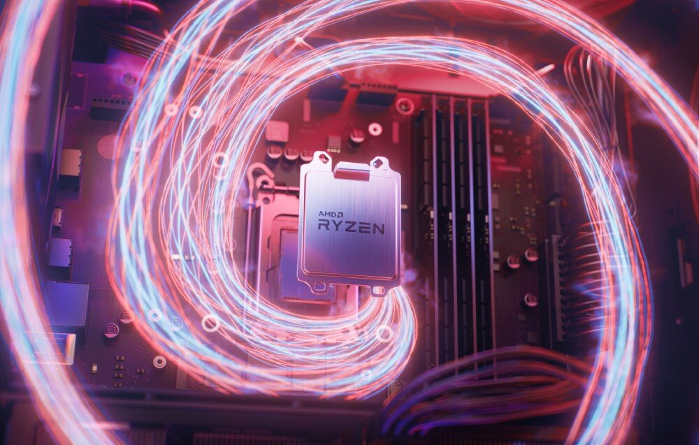 Komputer LENOVO Legion T5 30AGB10 Zbliżenie na procesor z napisem 'AMD Ryzen' na płycie głównej, otoczony efektami świetlnymi w formie spiralnych linii