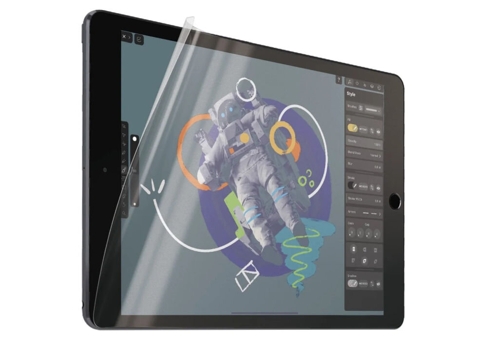 Na obrazie widoczny jest tablet z nałożoną folią ochronną, na ekranie którego znajduje się grafika przedstawiająca astronautę otoczonego kolorowymi kształtami. Po prawej stronie ekranu widoczny jest panel narzędziowy aplikacji graficznej.