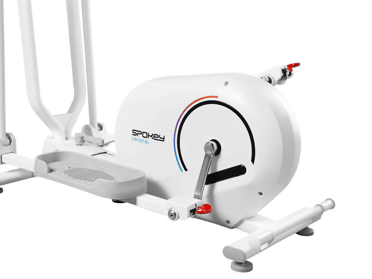 Orbitrek magnetyczny SPOKEY Crystal, elastyczność, różnorodność, mięśnie, dynamika, na białym tle od tyłu lewa strona zbliżenie na koło zamachowe