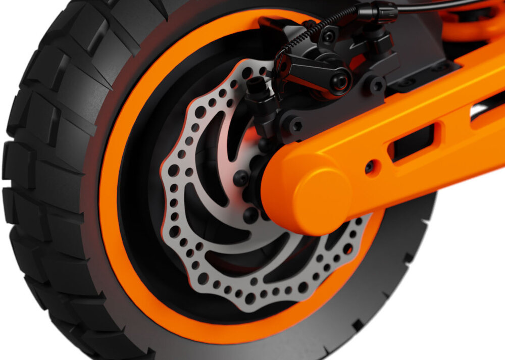 Hulajnoga elektryczna KAMIKAZE K1 Lite Lite 60km 800W Amortyzacja 10 cali Podświetlany podest Czarny zbliżenie na tylny hamulec przedni i tylny hamulec tarczowy mechaniczny wysoka skuteczność hamowania niezależnie od warunków jazdy duża siła działania pełna kontrola nad pojazdem prosta konstrukcja niemal bezawaryjne nie wymagają skomplikowanej konserwacji trwałość na różnych nawierzchniach