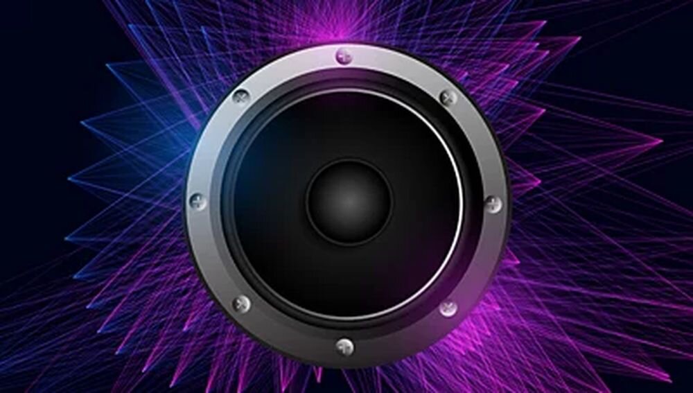 Projektor PHILIPS NeoPix NPX140 INT dwa głośniki stereo wyjście audio 3,5 mm, głośnik od frontu na ciemnym tle