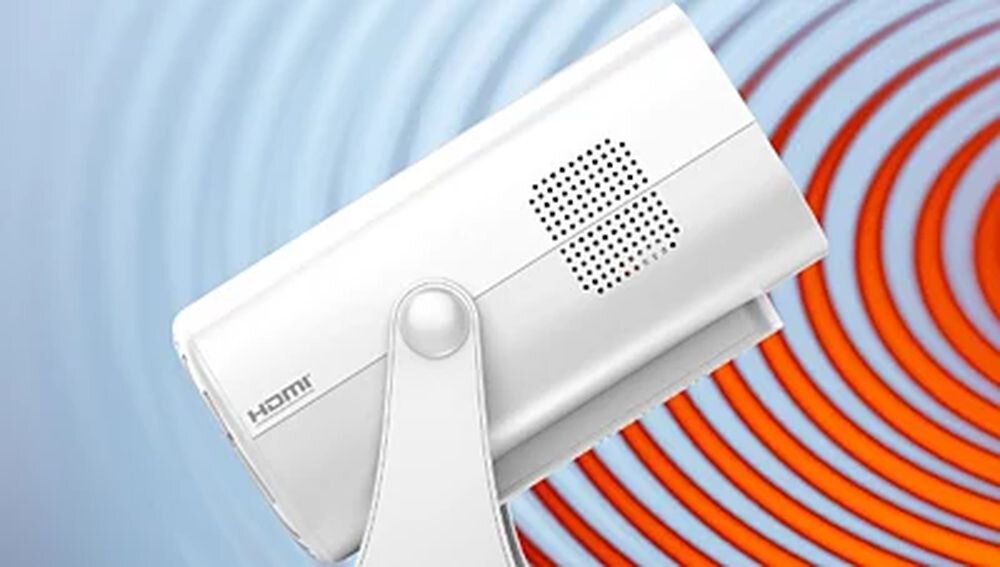 PHILIPS NeoPix 250 projektor Bluetooth bezprzewodowe głośniki klawiatura pilot, projektor z boku na kolorowym tle