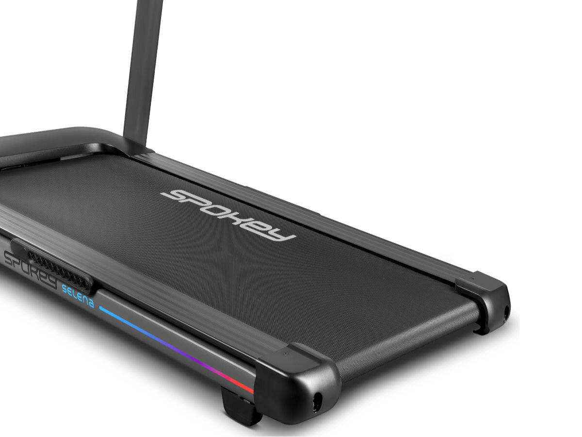 Bieżnia elektryczna SPOKEY Selena 1305W 14 km/h, moc, cisza, stabilność, płynność, Pas biegowy bieżni Spokey LEAN z kolorowym podświetleniem LED i logo. 