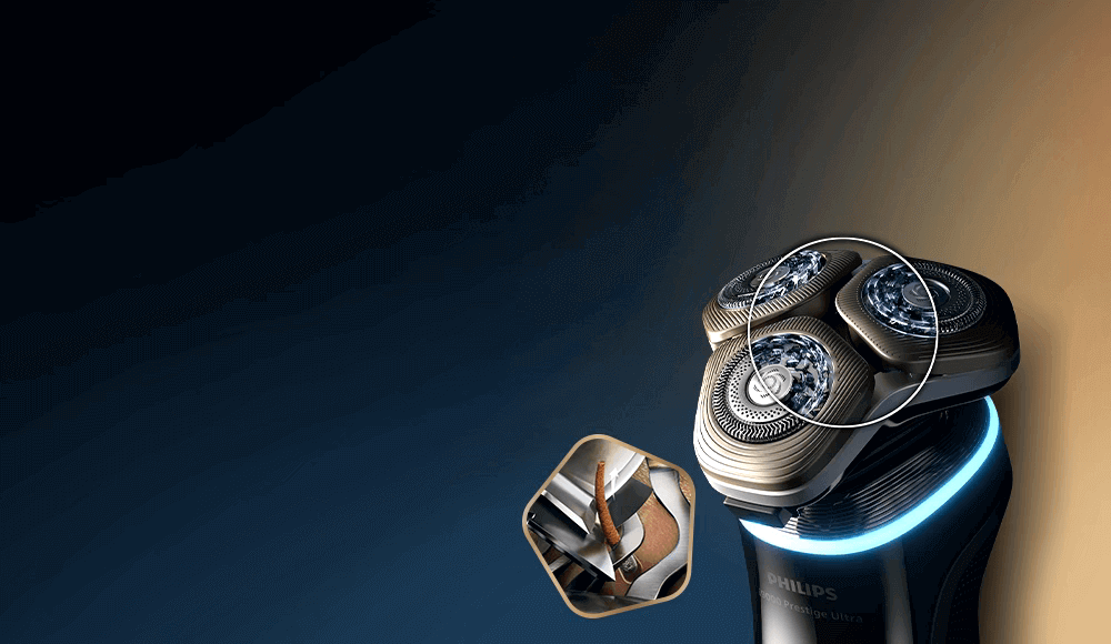 Głowice golarki. W wybranych miejscach przekrój ostrzy w powiększeniu. Obok małe zdjęcie ostrza tnącego włos.